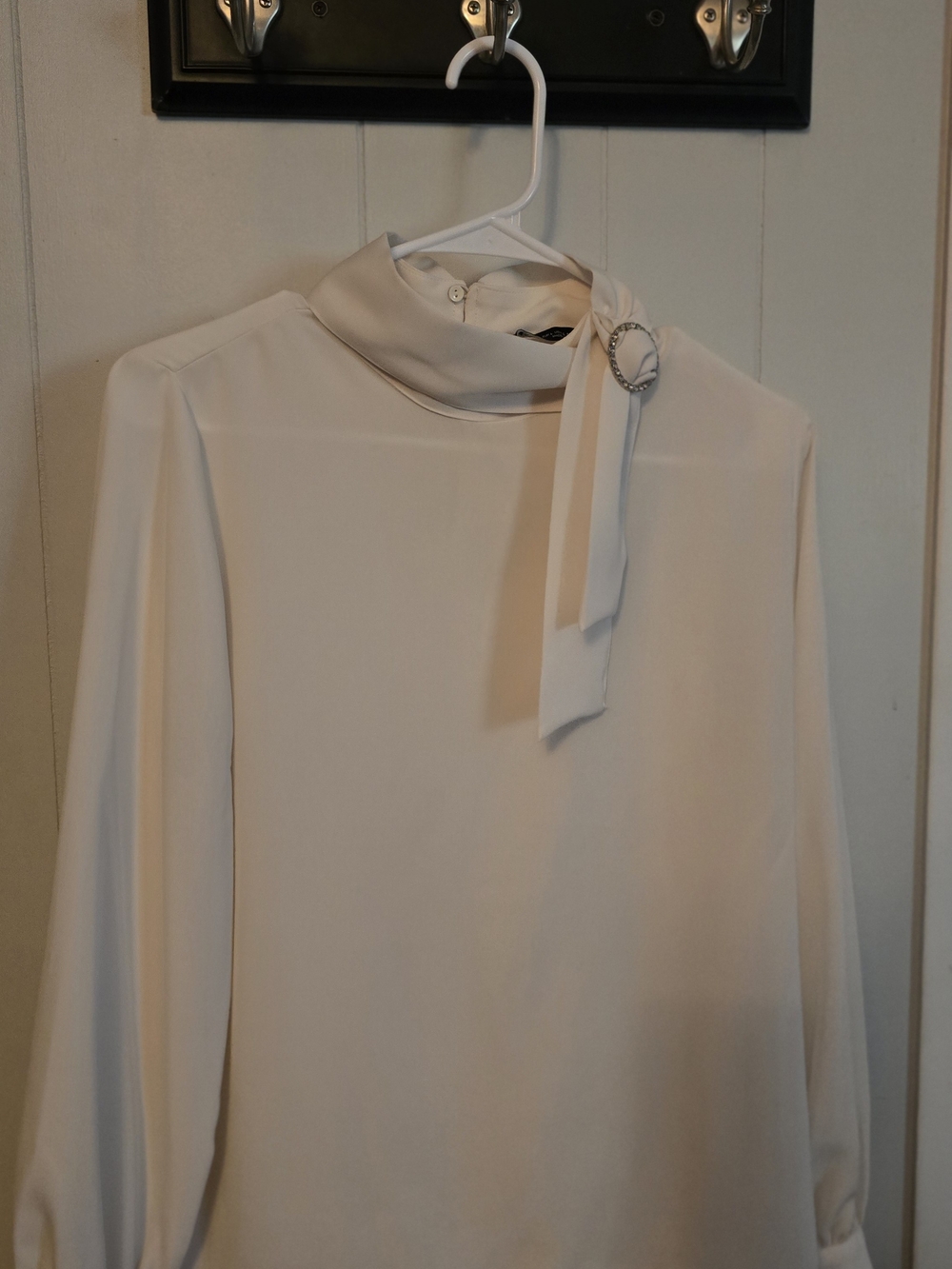 Zara Cream High-Neck Blouse with Tie and Decorative Ring